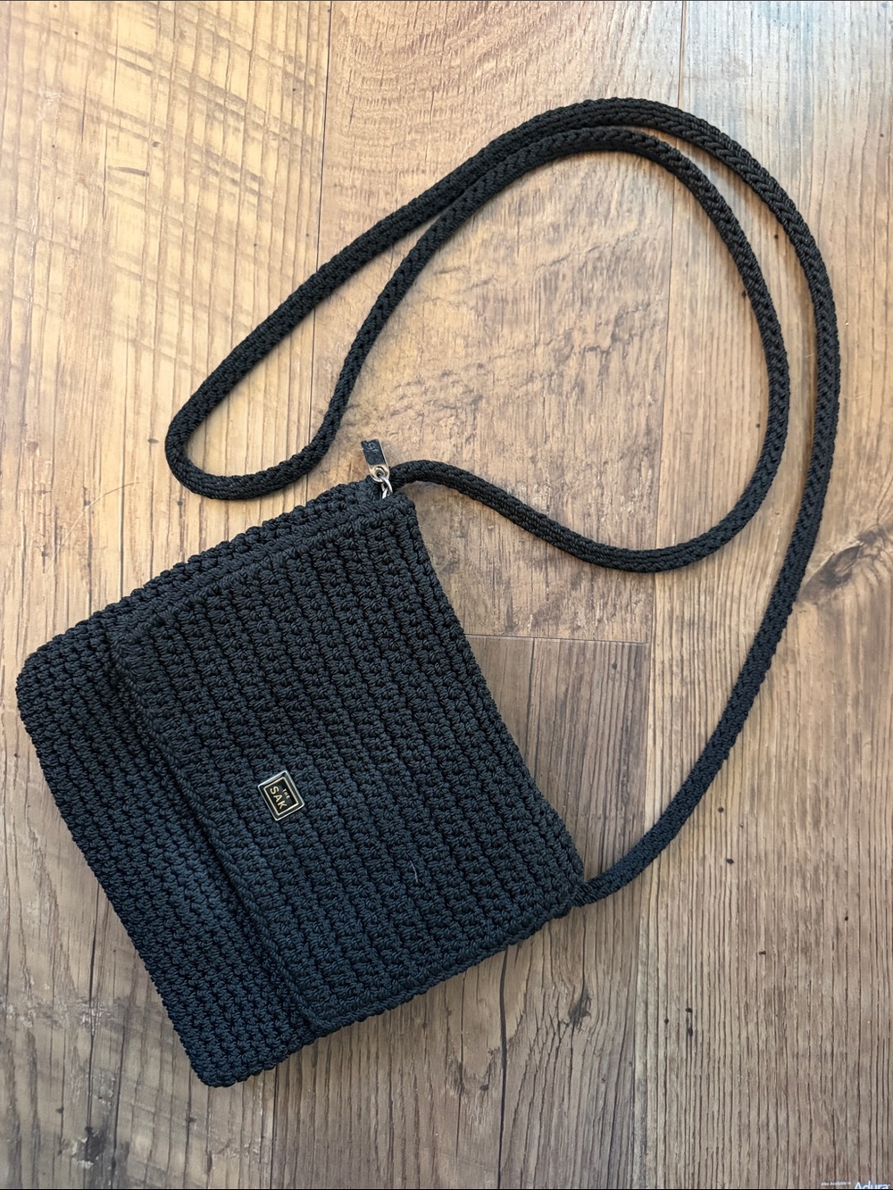 The Sak Black Crochet Crossbody Bag with Long Strap